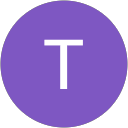 T B