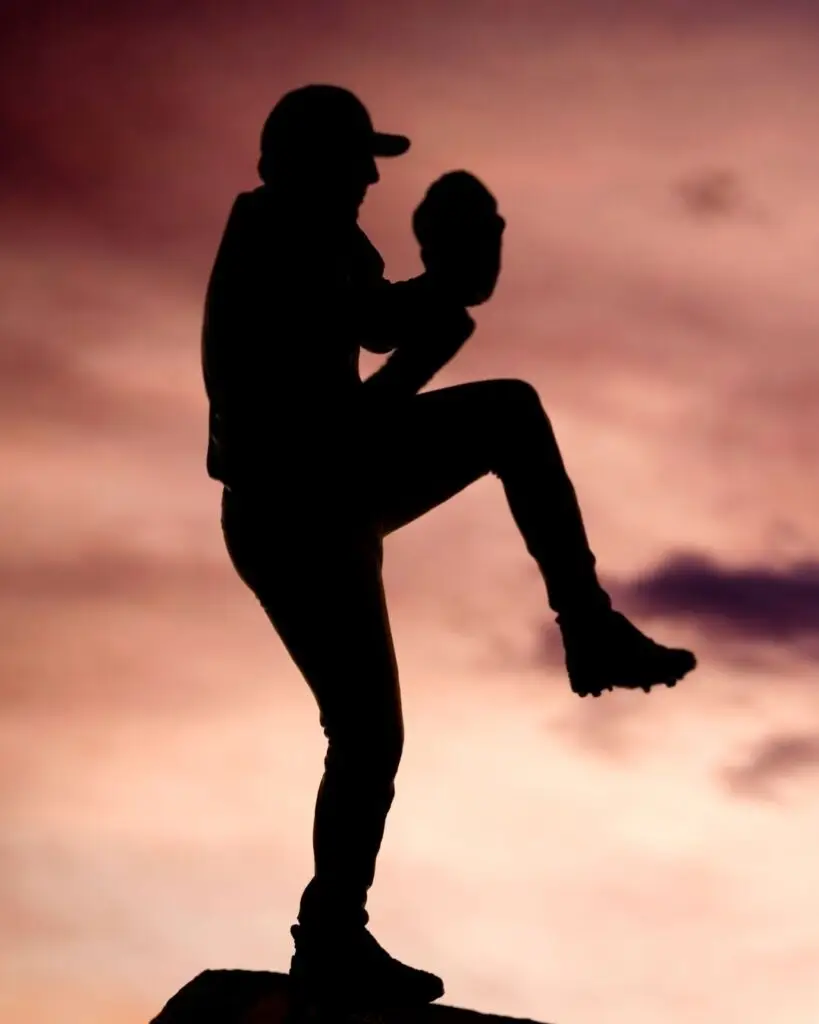 Baseball Pitcher - Orthopedic Centers of Colorado Generic baseball pitcher silhouette representing Tommy John surgery and UCL injury recovery